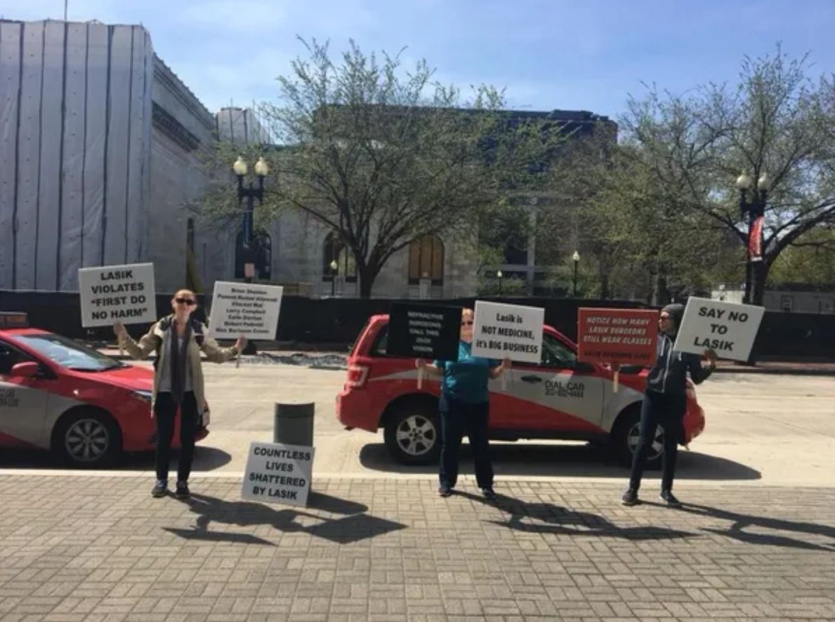 People protesting LASIK.